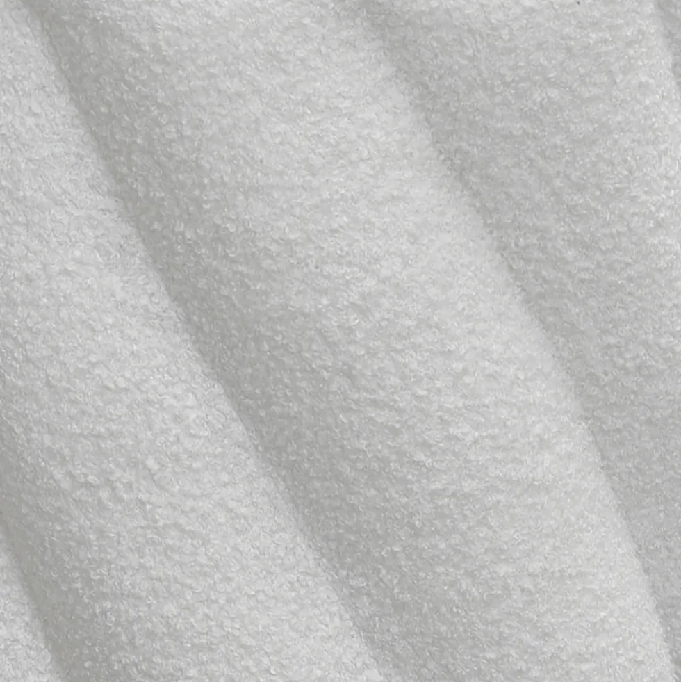 MALLOW Pouf rond en tissu bouclette ø37cm